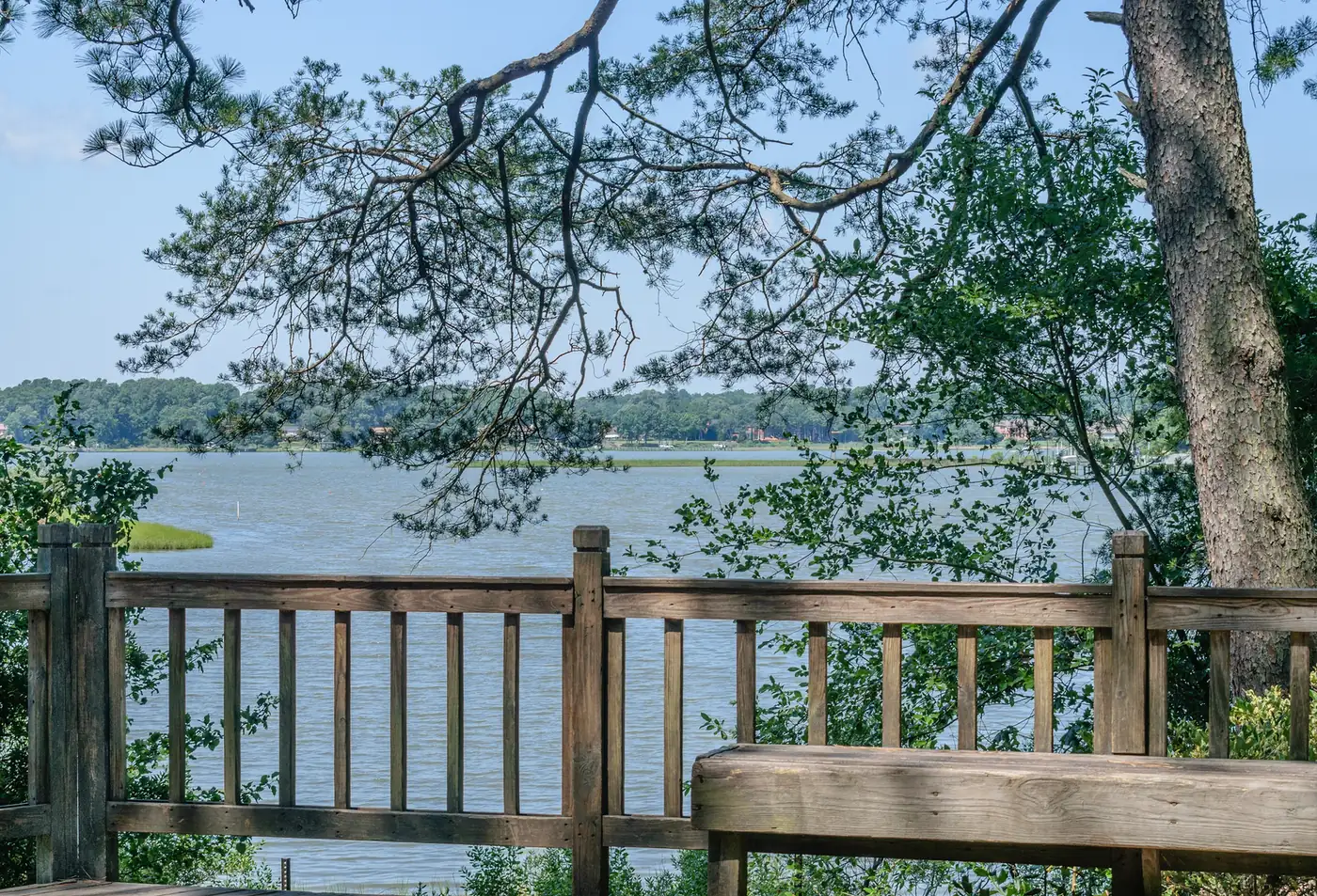 The Lynnhaven River seen through the trees from the gazebo at Great Neck Park in Virginia Beach.