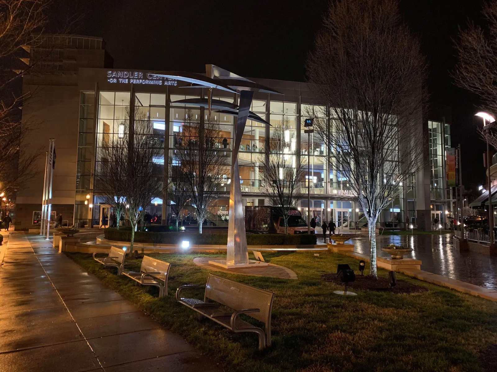 The Sandler Center for the Performing Arts lit up at night on Market Street in Town Center of Virginia Beach.
