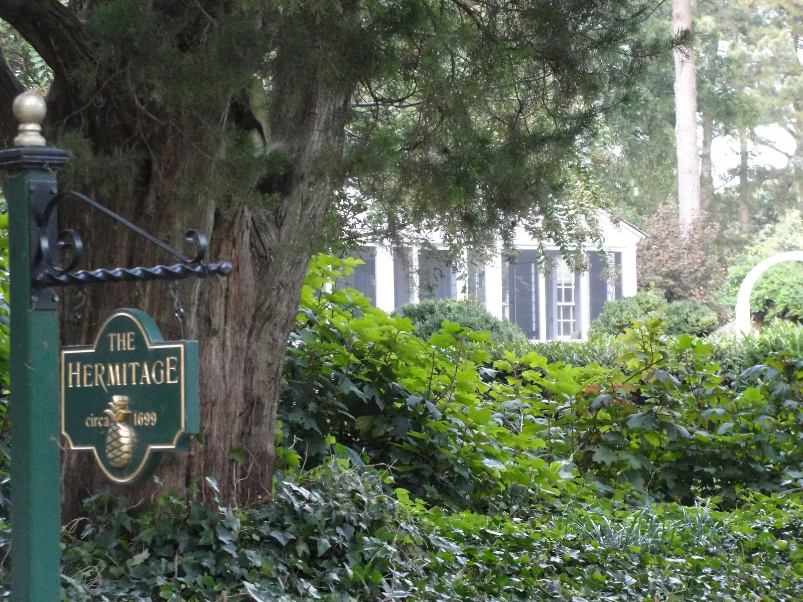 The Hermitage, a house dating to about 1699, and its sign in Virginia Beach.