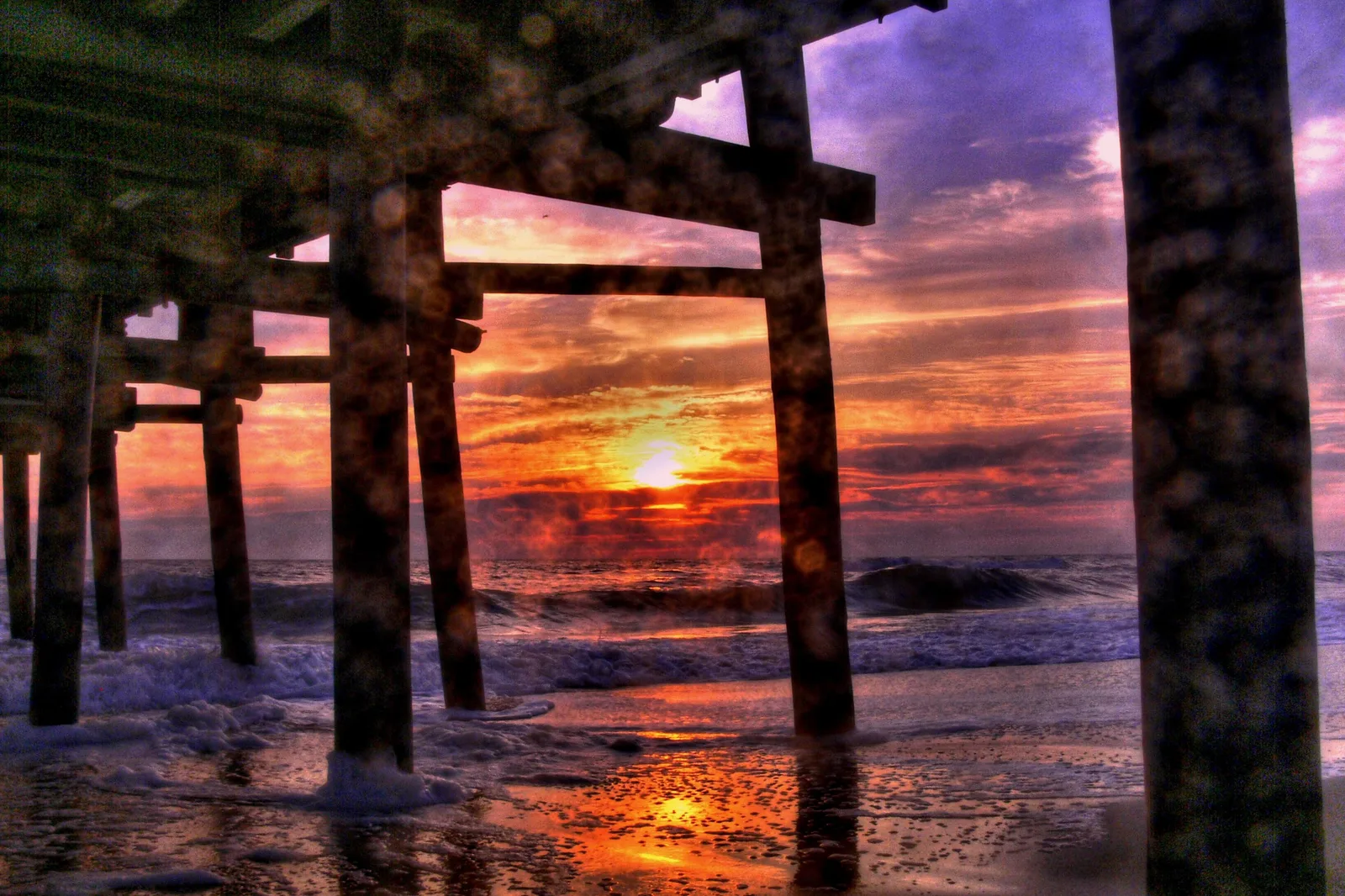 The Little Island Fishing Pier at sunrise in Sandbridge, Virginia Beach, where the city holds its free Party at the Pier nights.