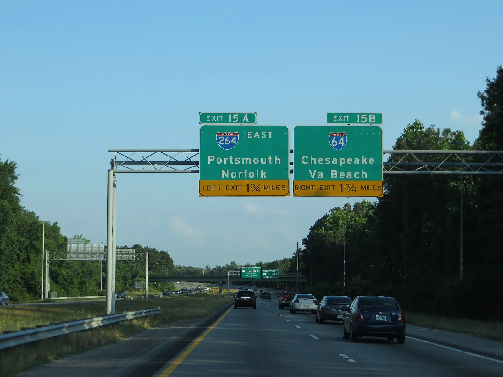 Signs on Interstate 664 southbound approaching the Bowers Hill interchange in Chesapeake point drivers to Portsmouth, Norfolk, Chesapeake and Virginia Beach.