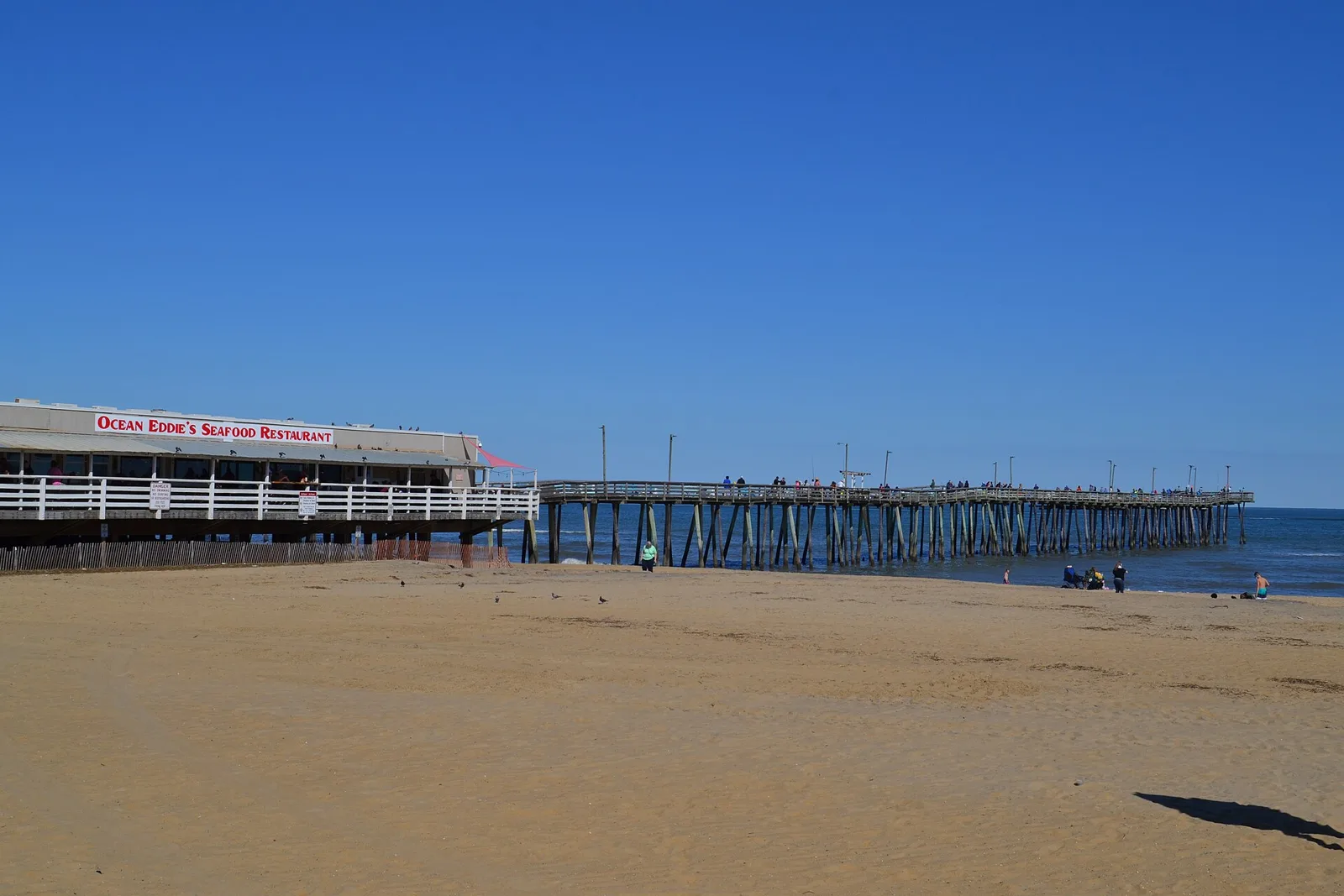 Ocean Eddie's Seafood Restaurant and the fishing pier on the beach at the Virginia Beach Oceanfront.