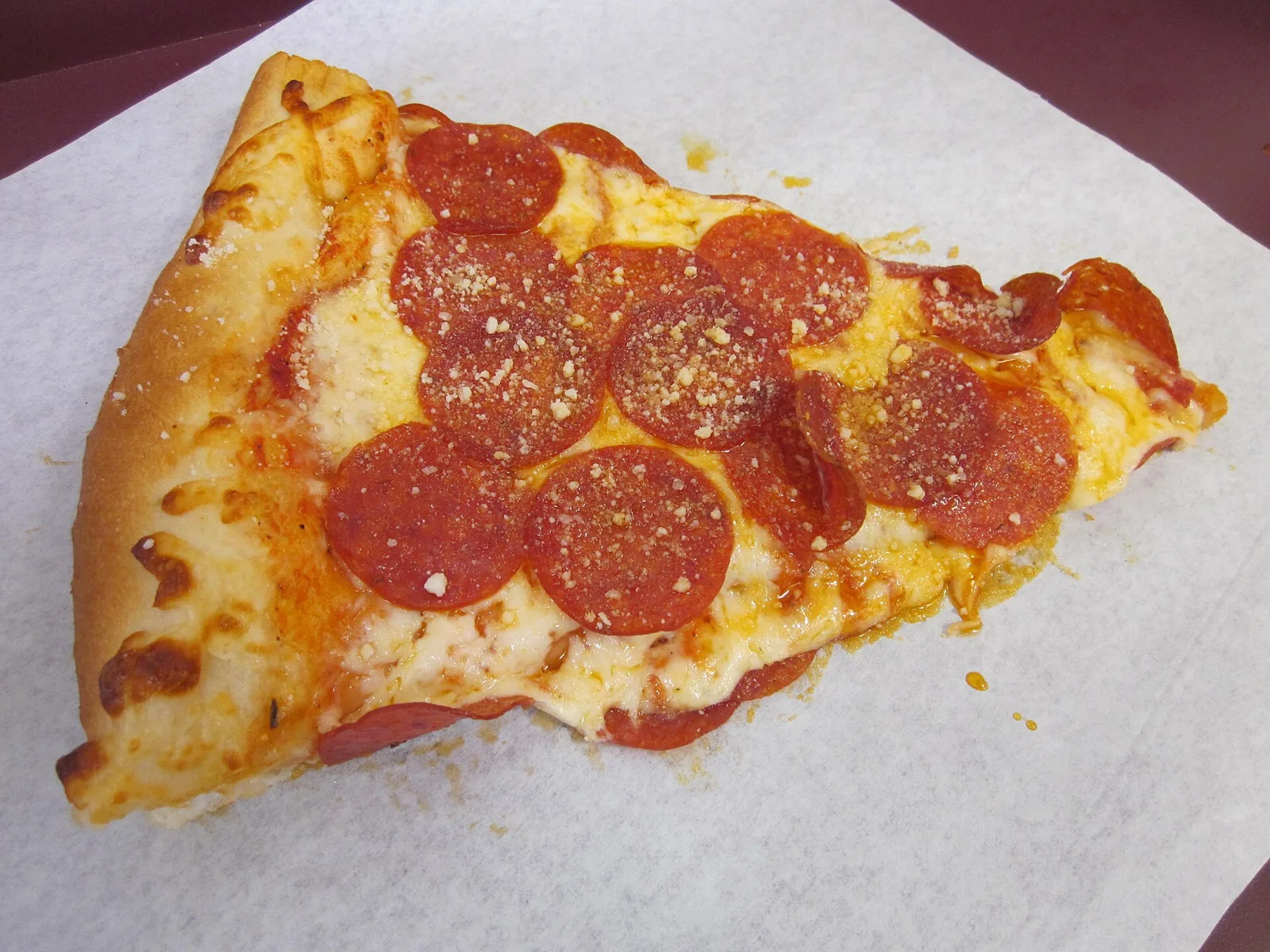 A slice of pepperoni pizza at a pizzeria in Berkeley, California.